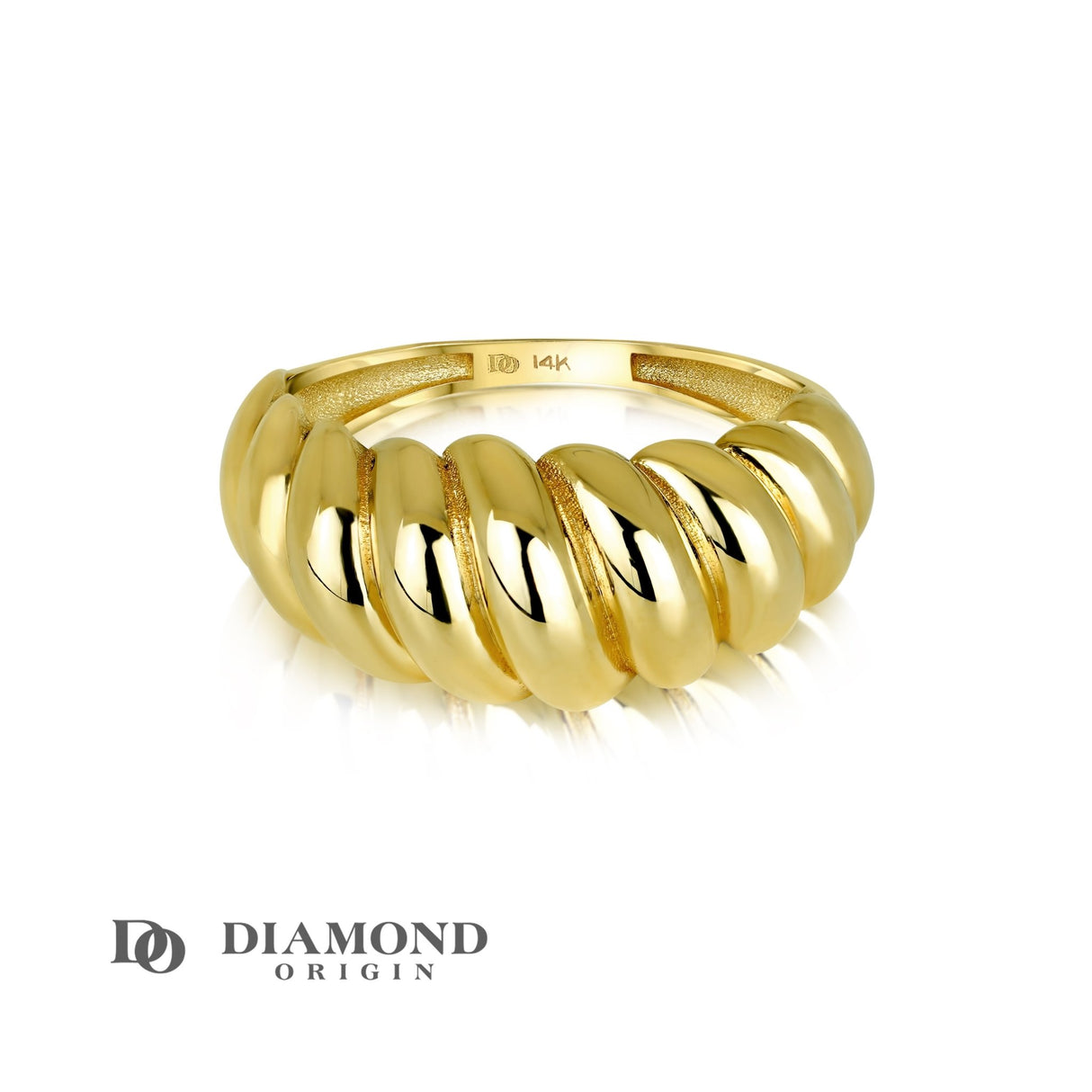 This exquisite Twisted Dome Ring from Diamond Origin perfectly captures the essence of timeless elegance and modern design. Crafted from the finest gold, the ring boasts a unique twisted dome shape that makes a bold yet refined statement. diamond origin, stackable rings, gold rings, 14K gold rings,
